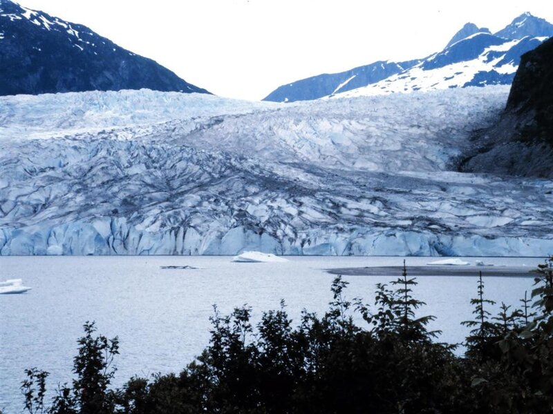 Glacier Calving into Lake — Blue, Serene