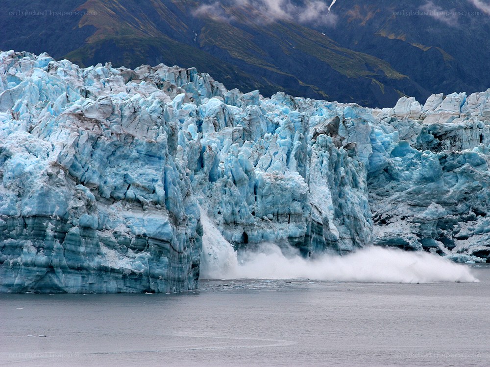 Glacier calving into the sea