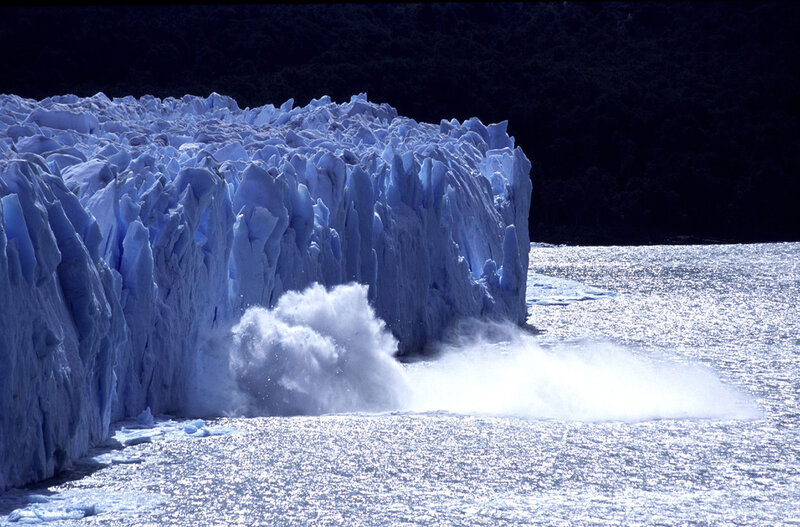Glacier calving into water