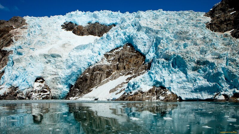 Glacier Calving into Water — Blue