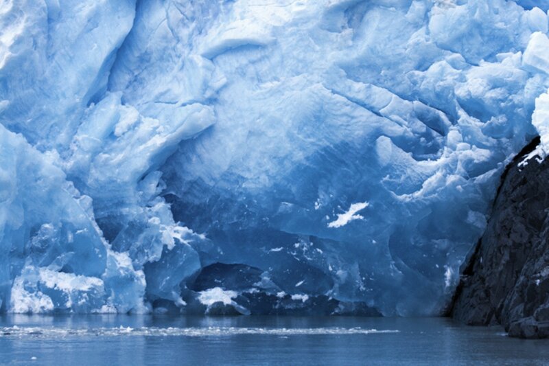 Glacier Face in Water — Blue