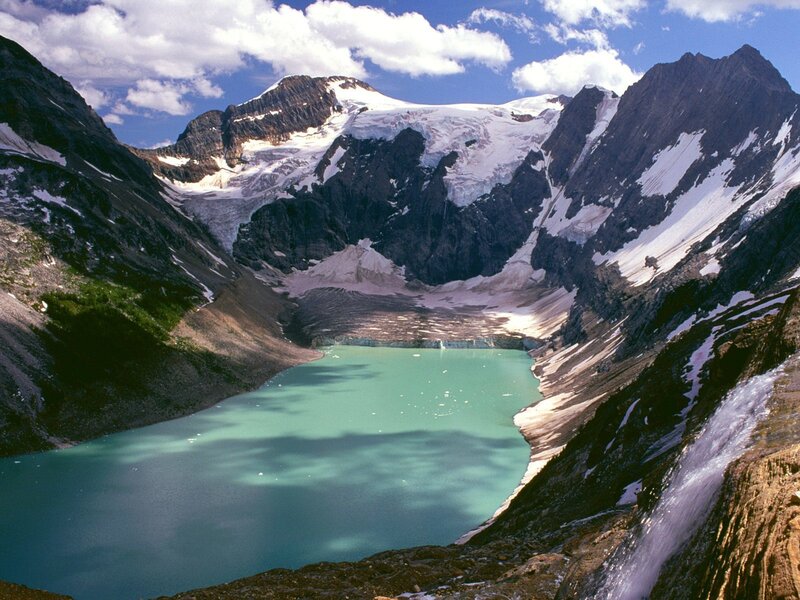 glacier-fed lake in mountain valley