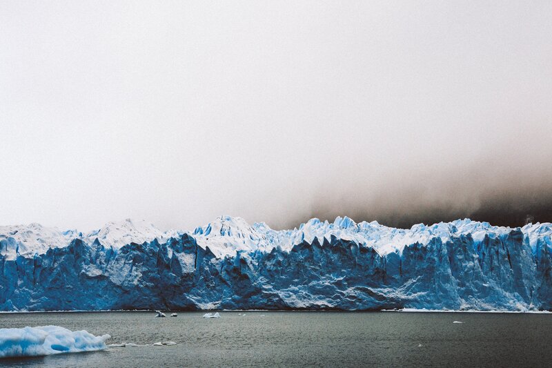Glacier front with icebergs