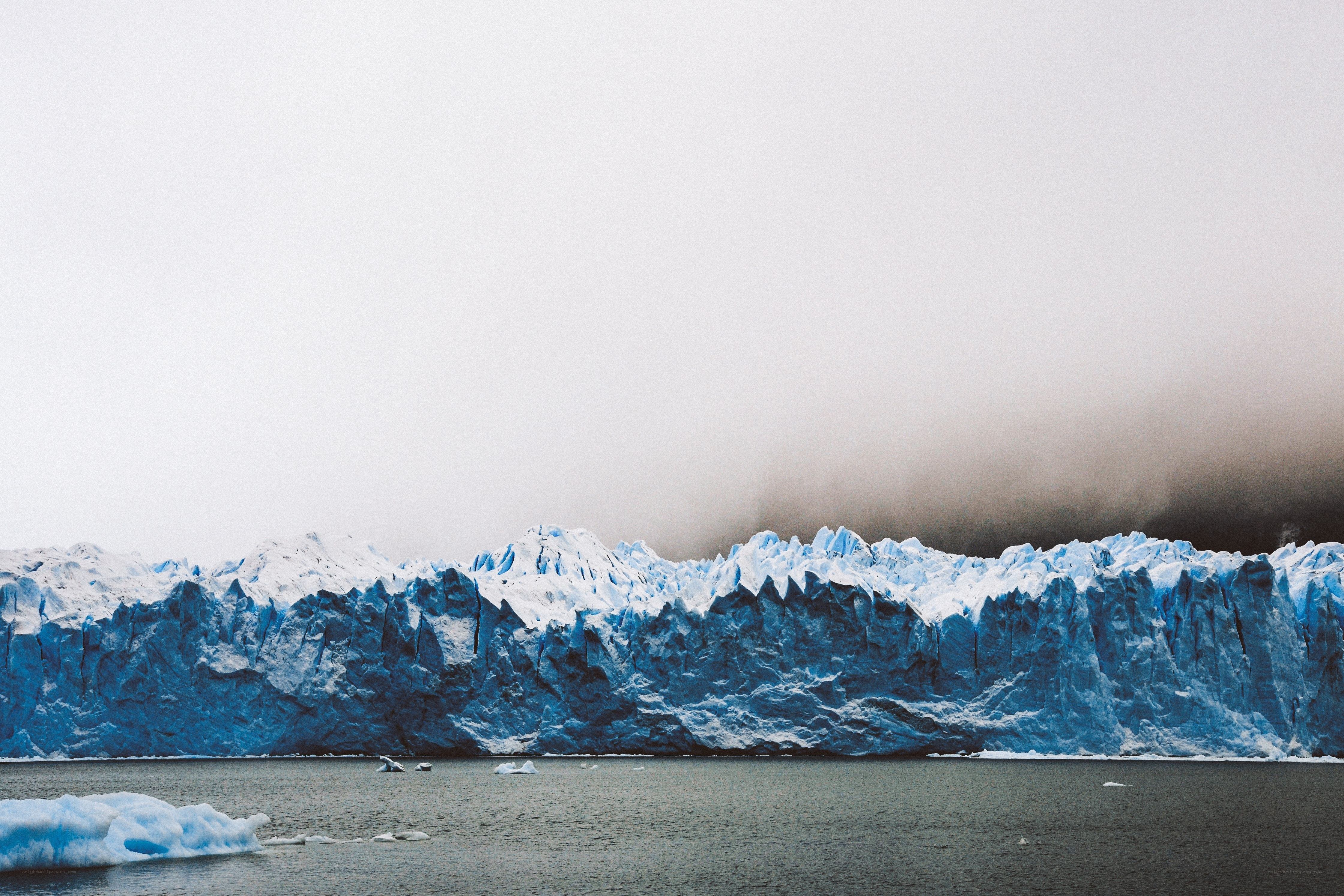 Glacier front with icebergs