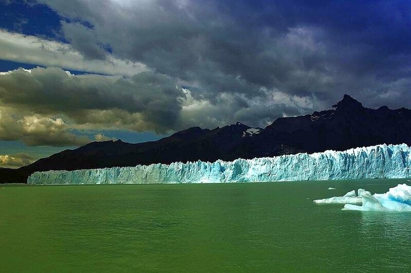 Glacier in a green lake