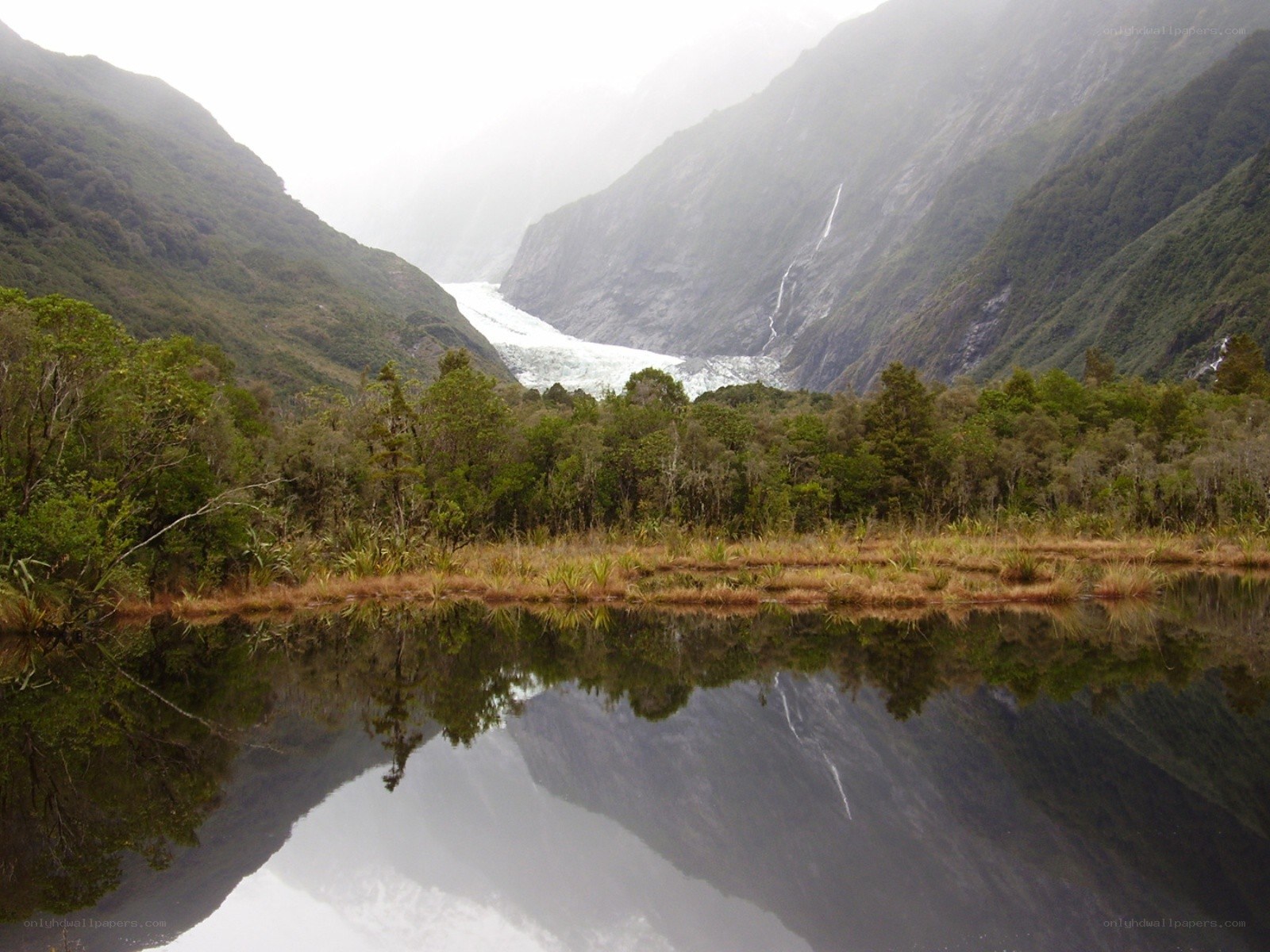Glacier in a misty valley