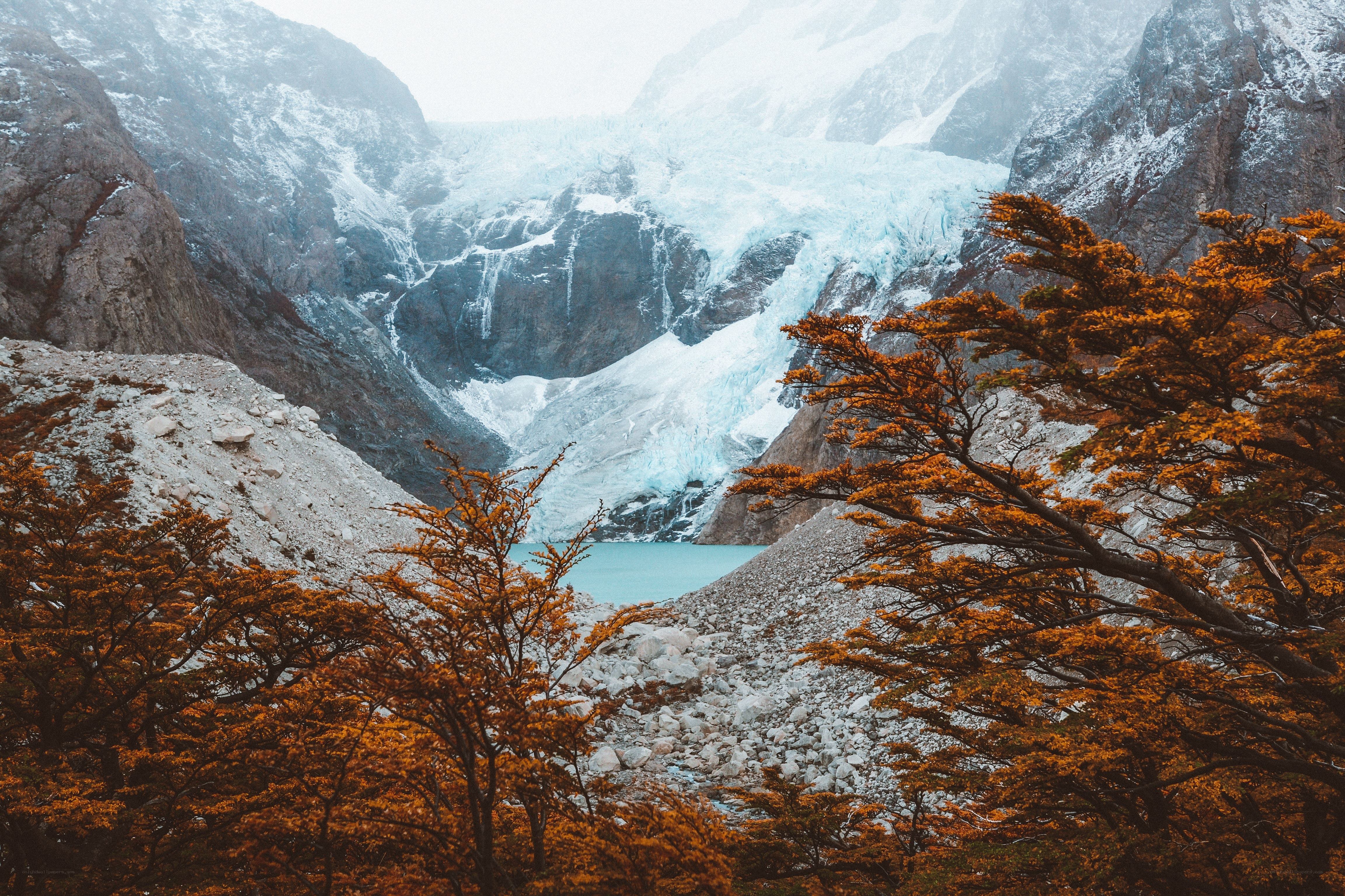 Glacier in autumn mountains