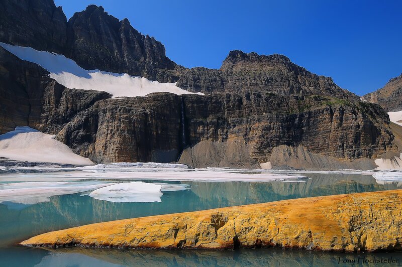 Glacier lake with mountain backdrop