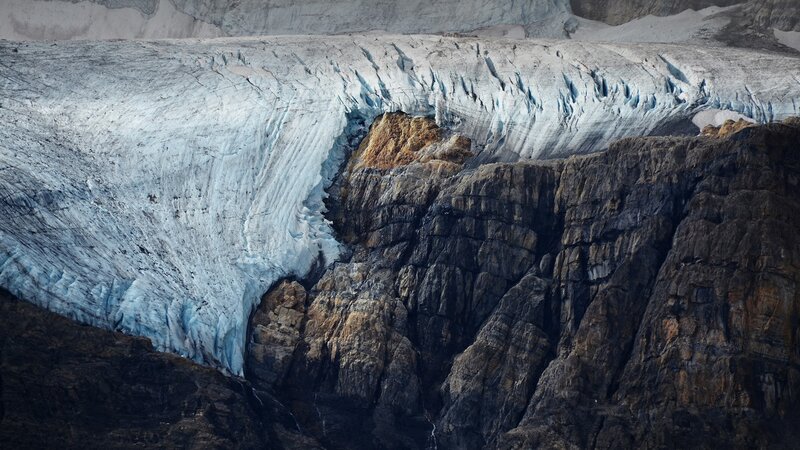 Glacier on Rocky Cliff