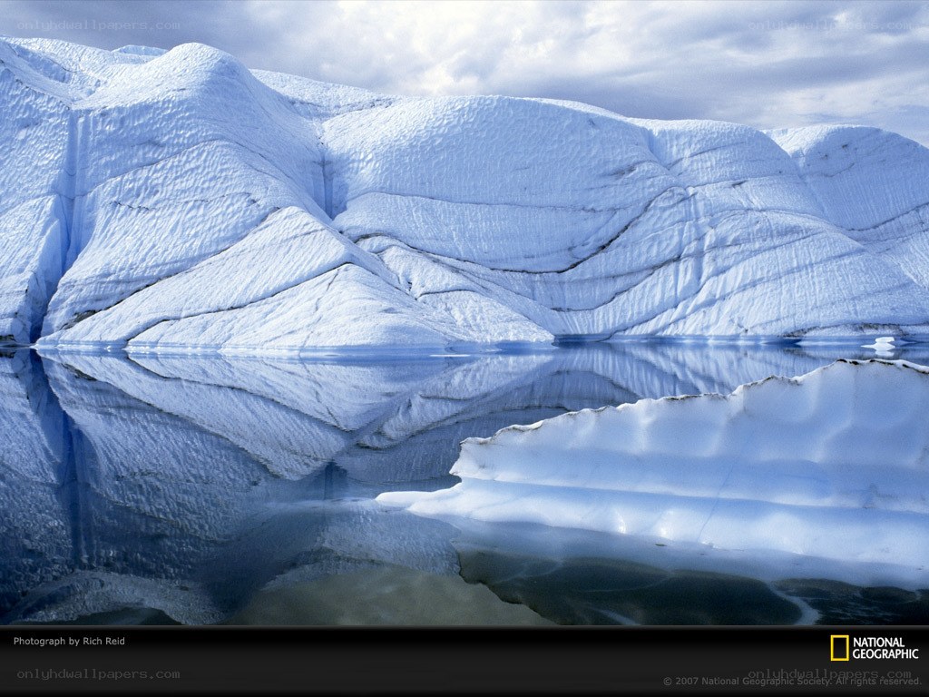 Glacier reflection in calm water