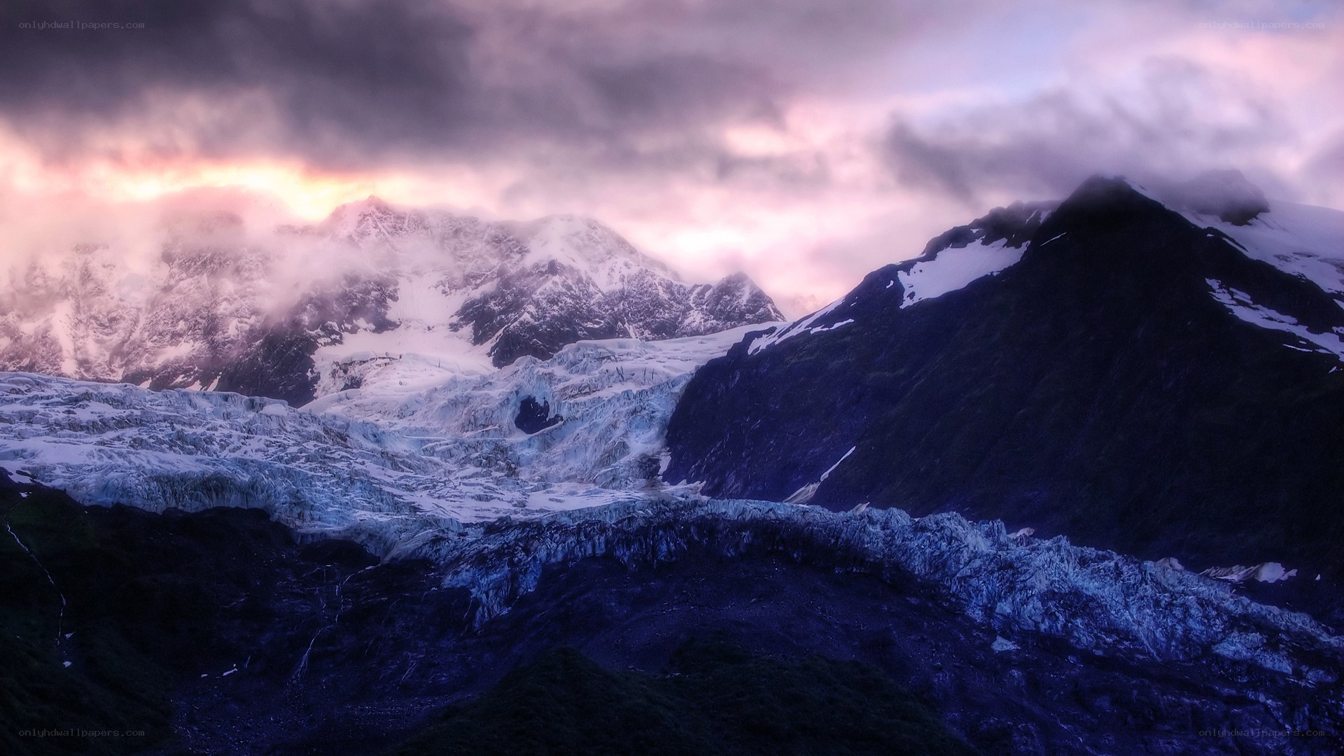 glacier under stormy sky