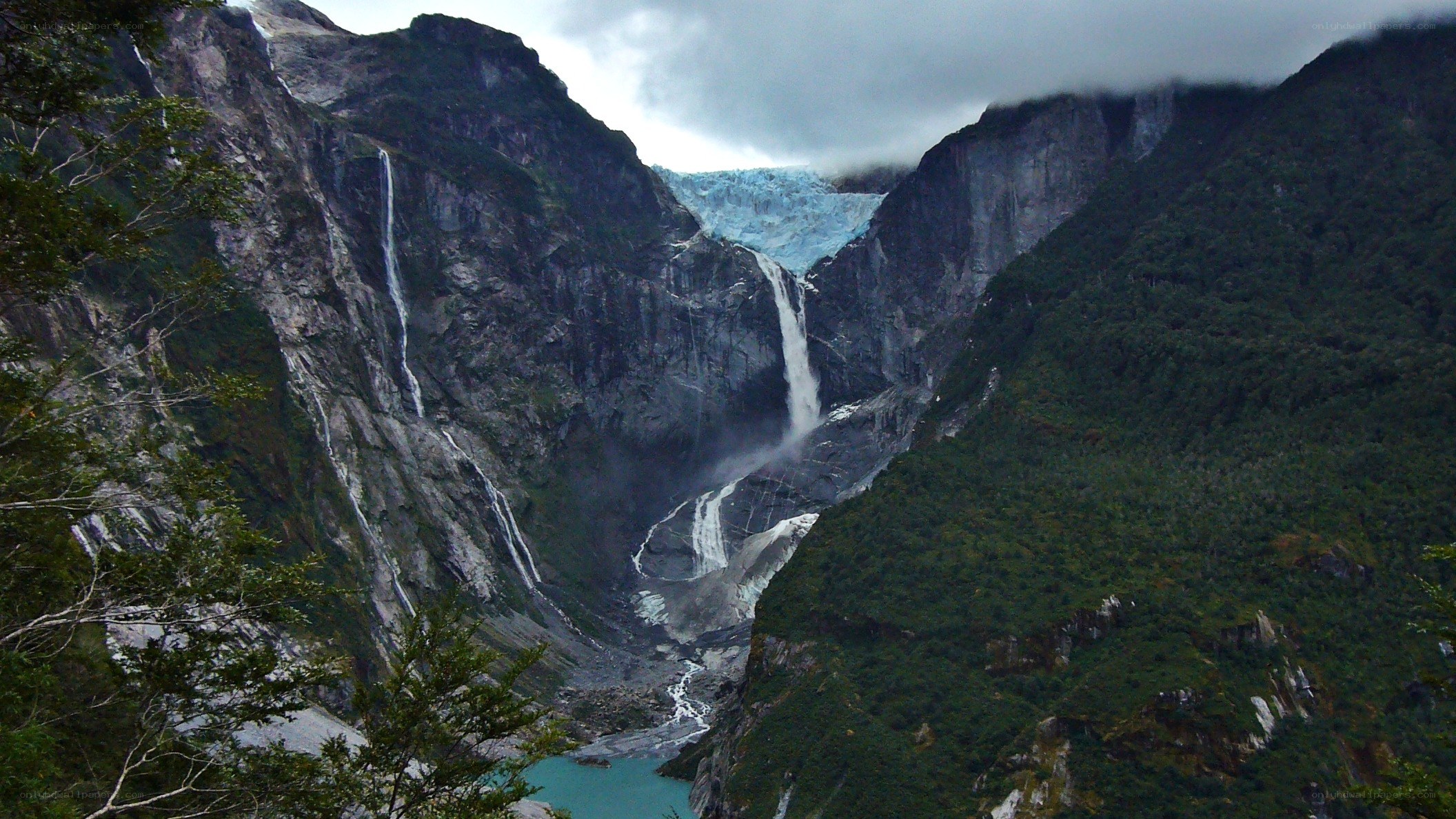 glacier waterfall in mountain valley