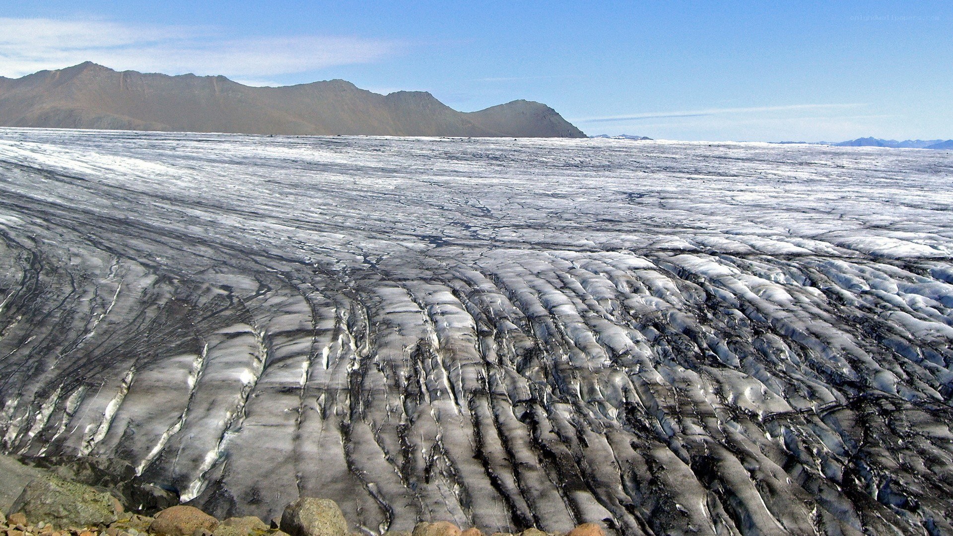 Glacier with mountain backdrop