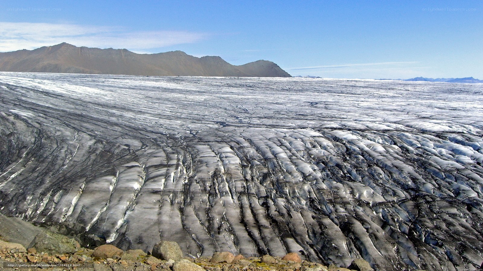 Glacier with mountain backdrop