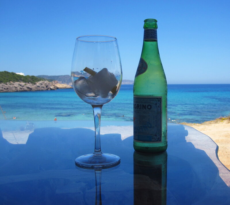 Glass and Bottle on Table