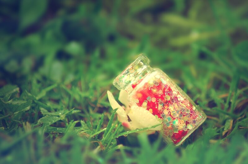 Glass Bottle in Grass — Green, Serene