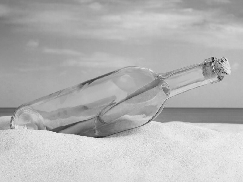 Glass Bottle on Beach — Black