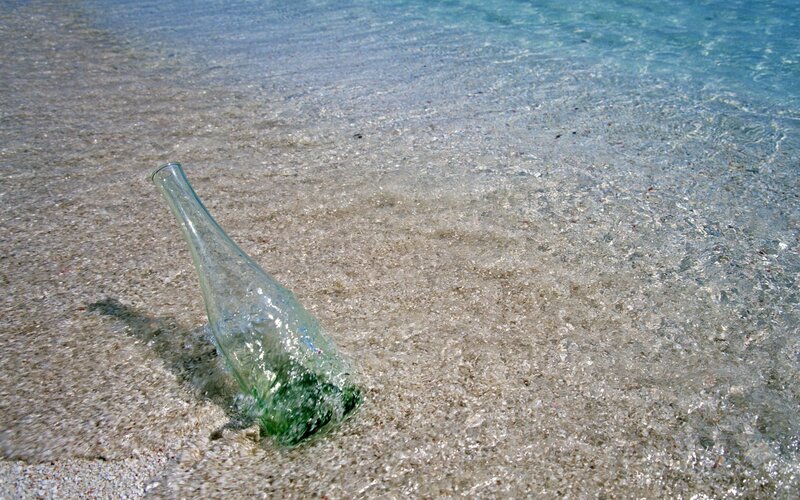 glass bottle on beach