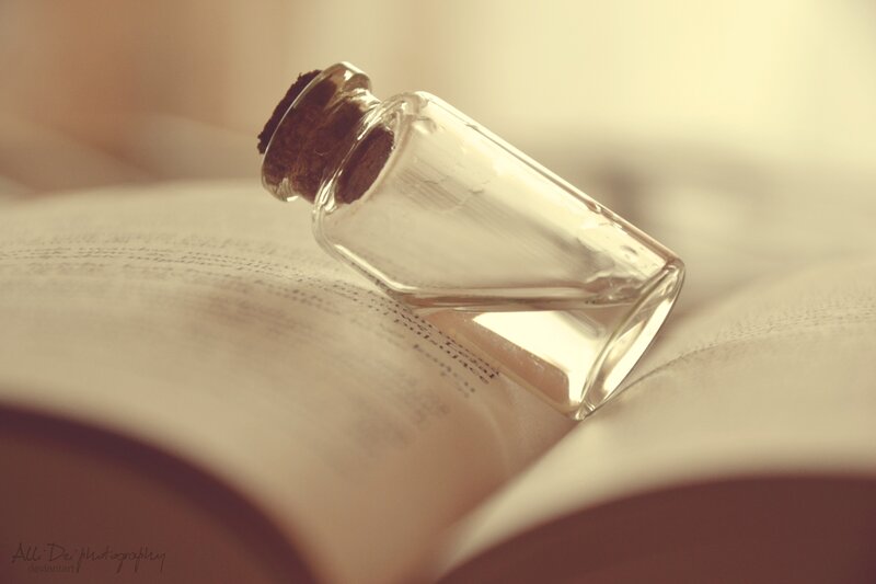 Glass Bottle on Book