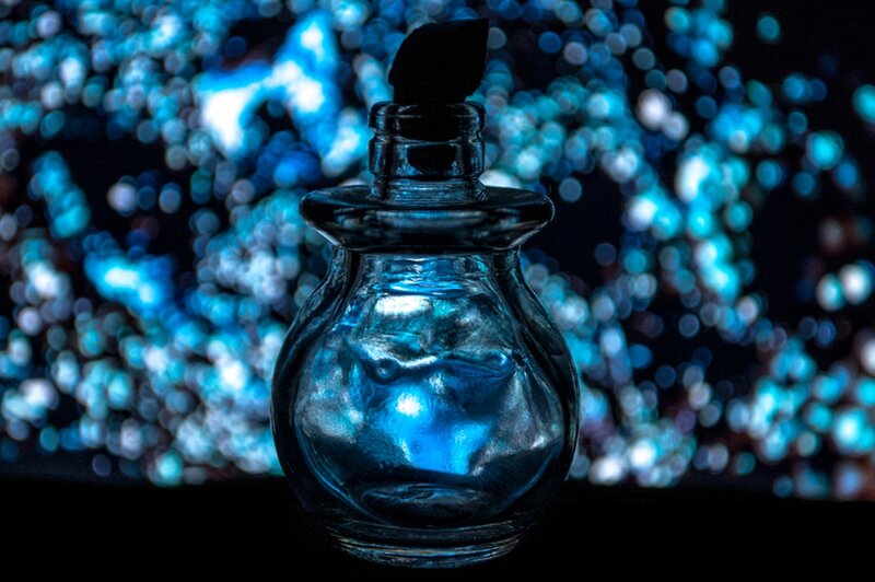 Glass Bottle with Blue Liquid — Mysterious
