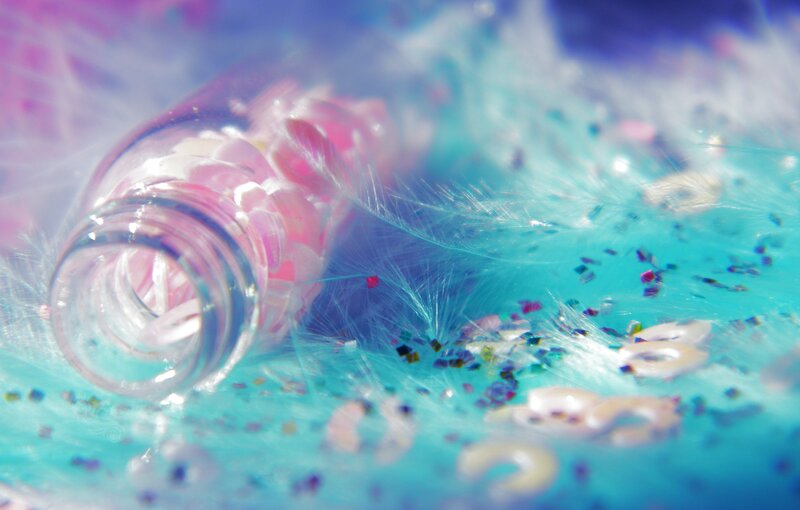 Glass Bottle with Feathers