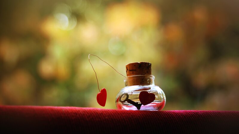 Glass Bottle with Key and Hearts