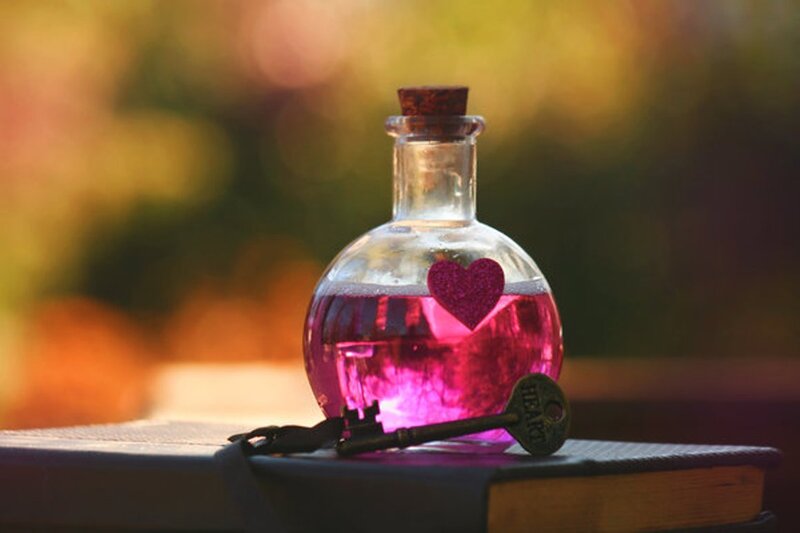 Glass Bottle with Pink Liquid — Serene
