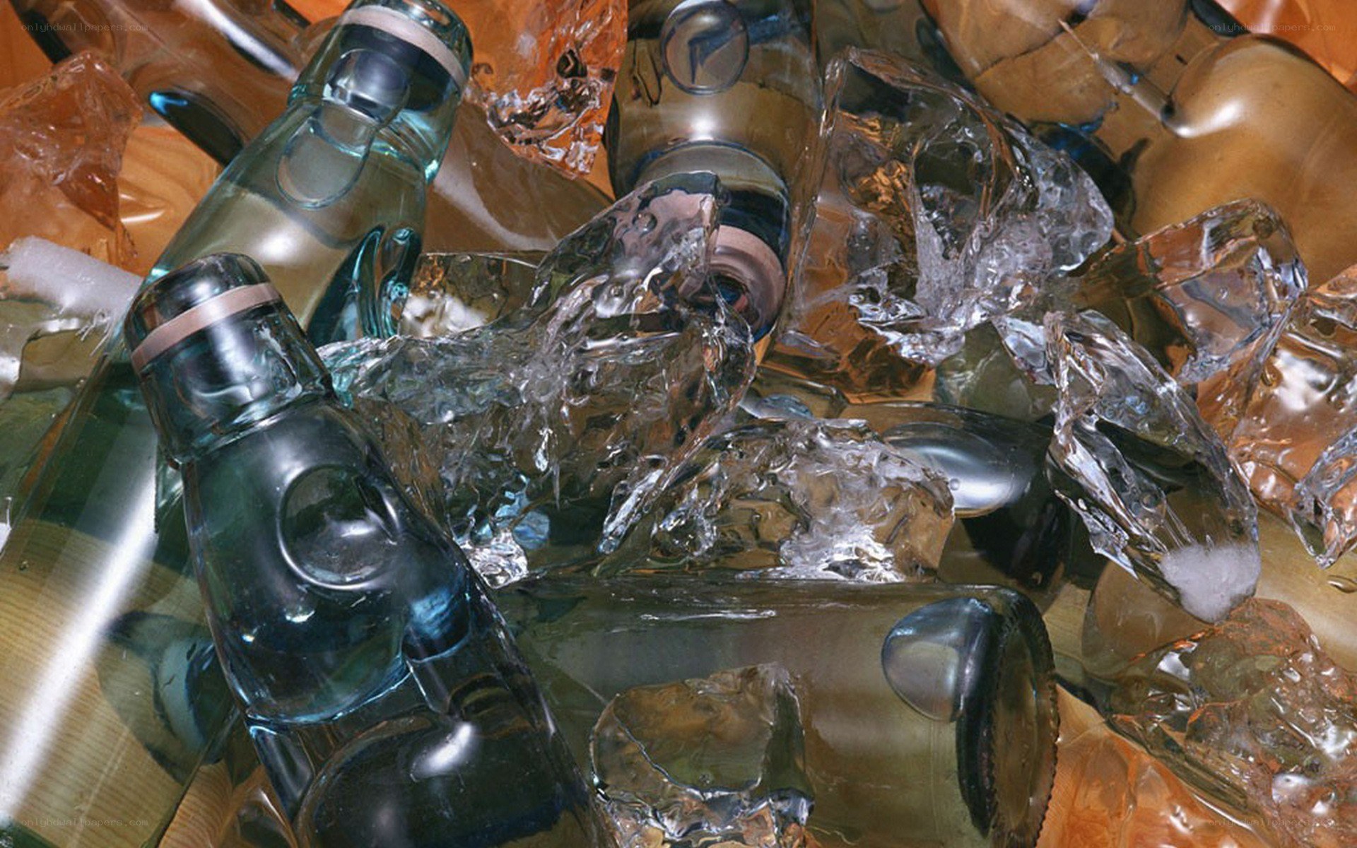 Glass bottles and ice cubes