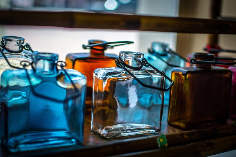 Glass Bottles on Shelf — Blue