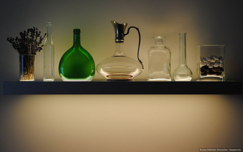 Glass Bottles on Shelf