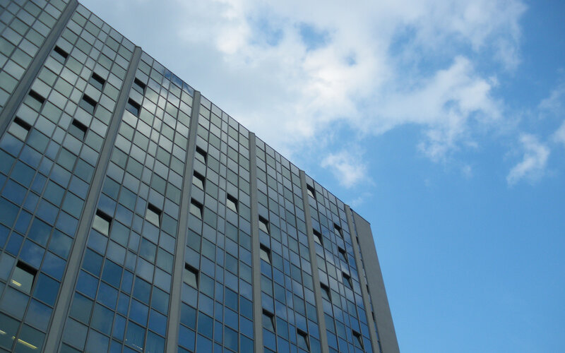 Glass Building Facade — Blue, Serene, Afternoon