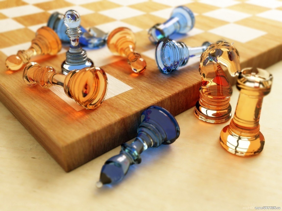 Glass chess pieces on board