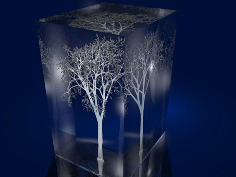 glass cube with tree sculptures