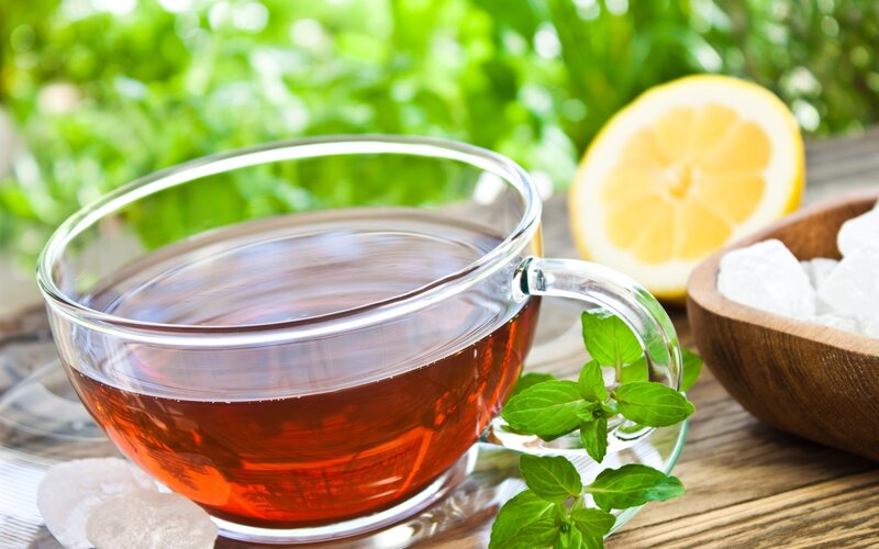 Glass Cup of Tea — Brown
