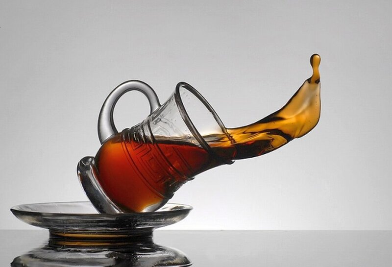 Glass Cup Pouring Liquid