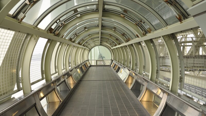 glass-enclosed walkway tunnel