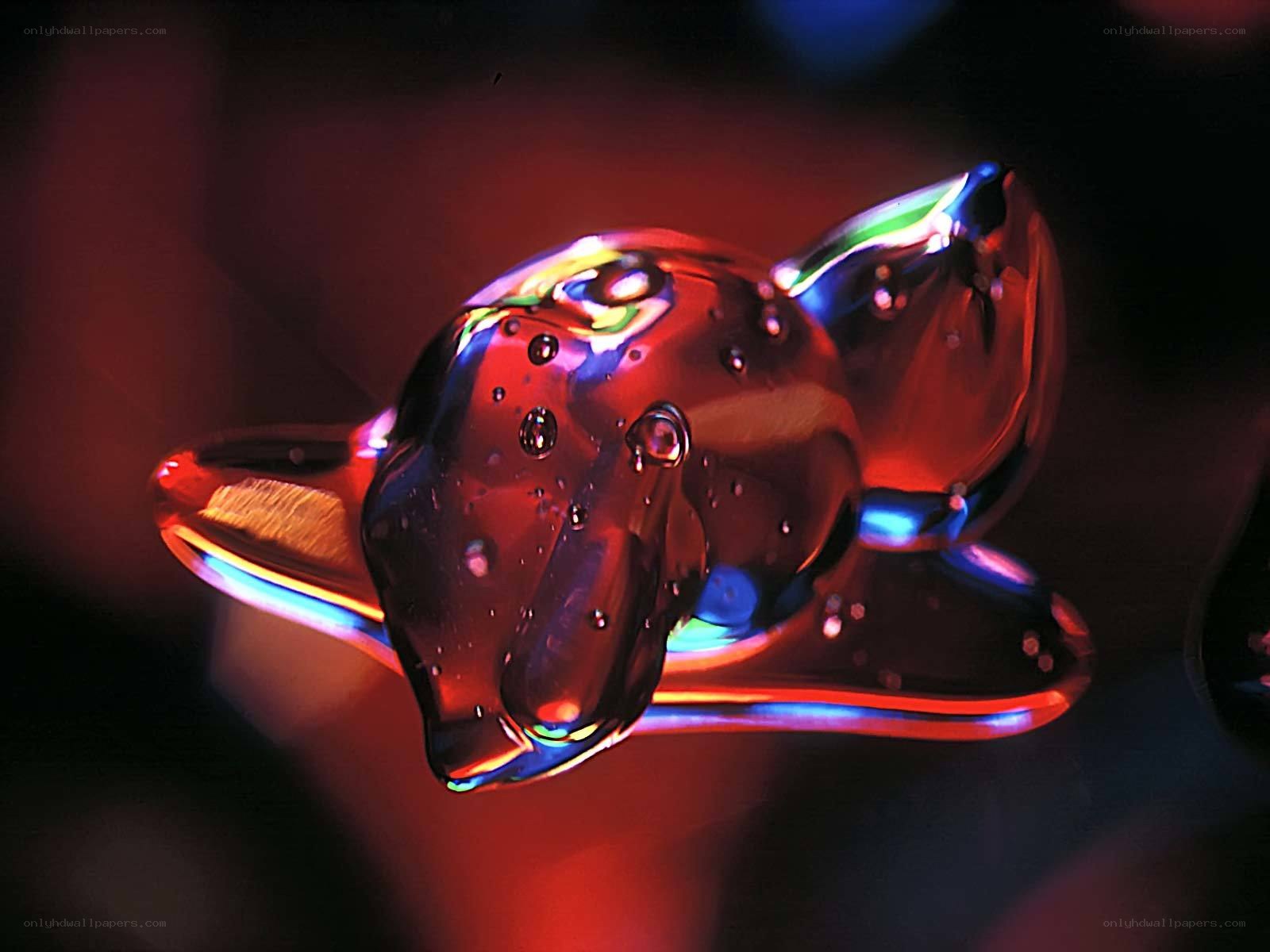 glass fox figurine under colored light