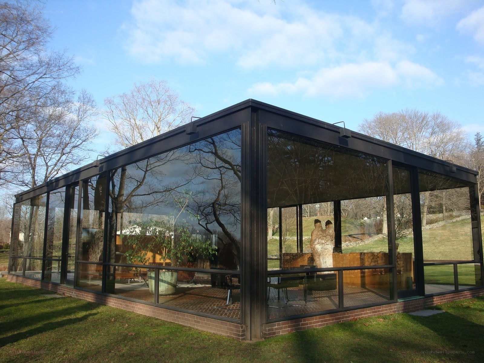 glass house with sculpture