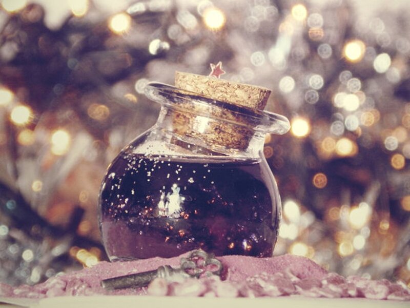 Glass Jar with Dark Liquid