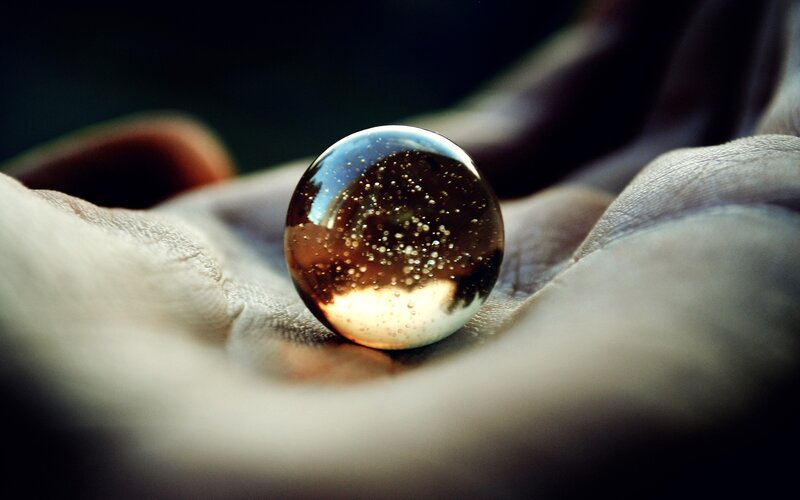 Glass Marble in Hand