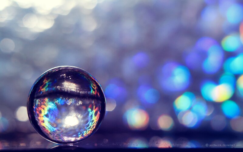 Glass Marble on Surface — Blue