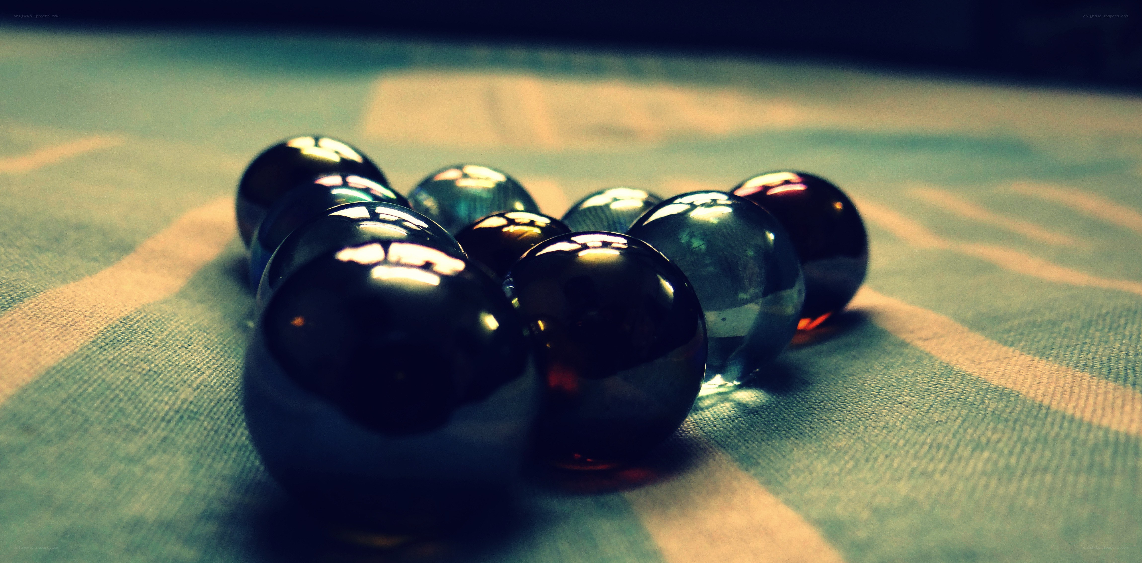glass marbles on fabric
