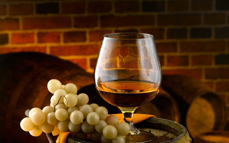 Glass of Brandy with Grapes