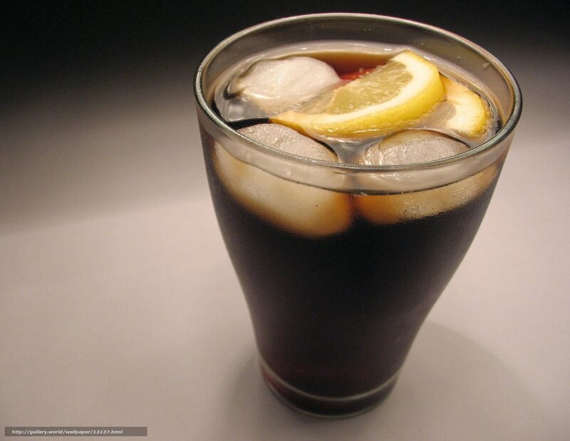 glass of cola with lemon and ice