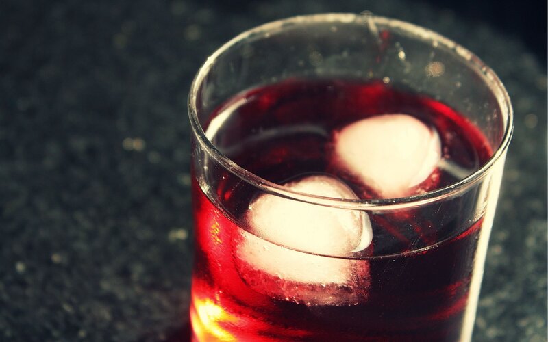 Glass of Red Drink — Moody