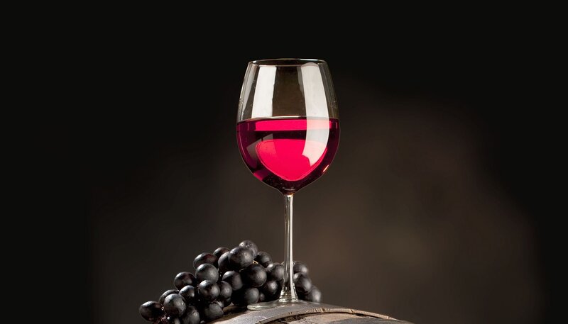 Glass of Red Wine — Dramatic, Photograph, Grapes