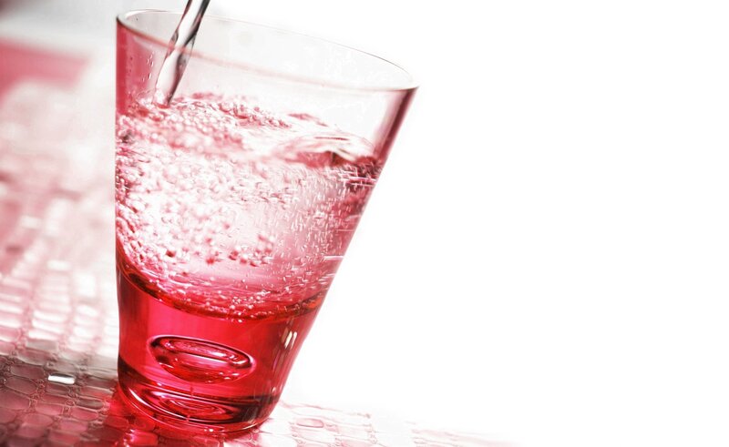 Glass of Water Being Poured