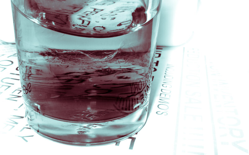 glass of water on paper