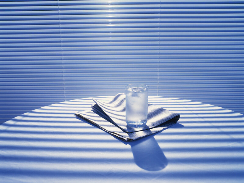 Glass of Water on Table — Blue