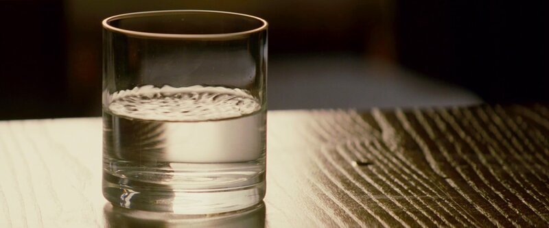 glass of water on table